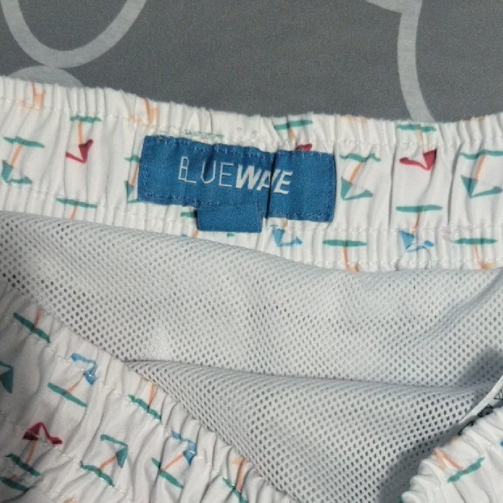 Men’s Stylish White Swim Trunks with Multicolor Print